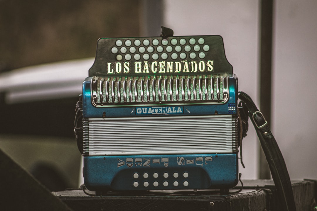 Spanish voice over artist recording in a professional studio with microphone